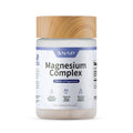Supplement jar labeled 'Magnesium Complex' with a wooden cap on a white background