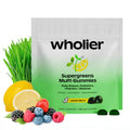 Wholier Supergreens Multi Gummies packaging with lemon, berries, and grass on a white background