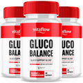 Three bottles of Vitaflow Gluco Balance supplement with red caps and white labels.