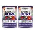 Two cans of Dr. Schulze's SuperFood Ultra on a white background